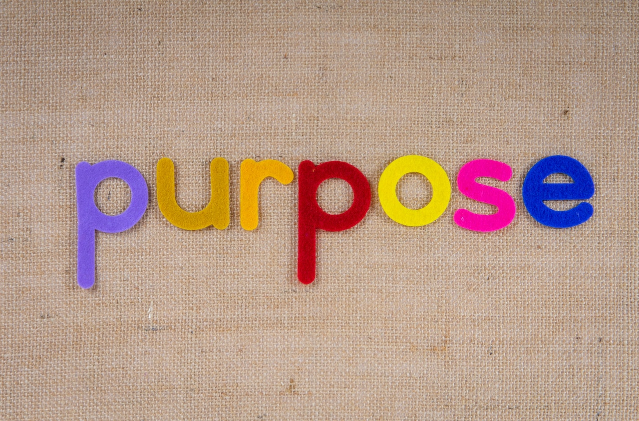 felt letters spelling the word 'purpose'